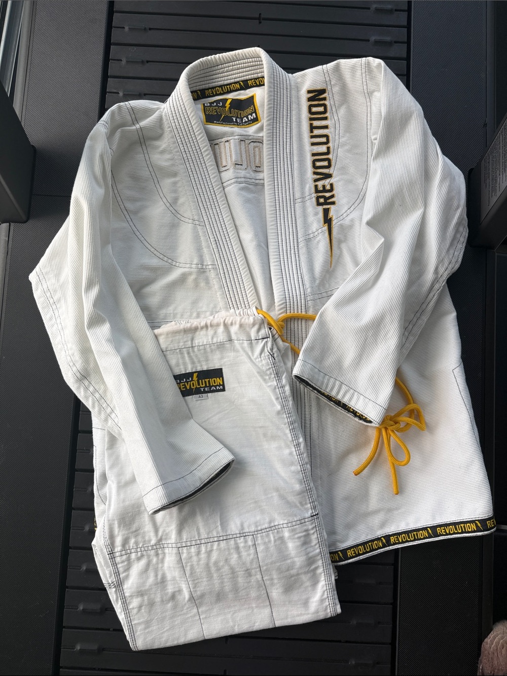 Revolution White Gi with Yellow Trim and Logos